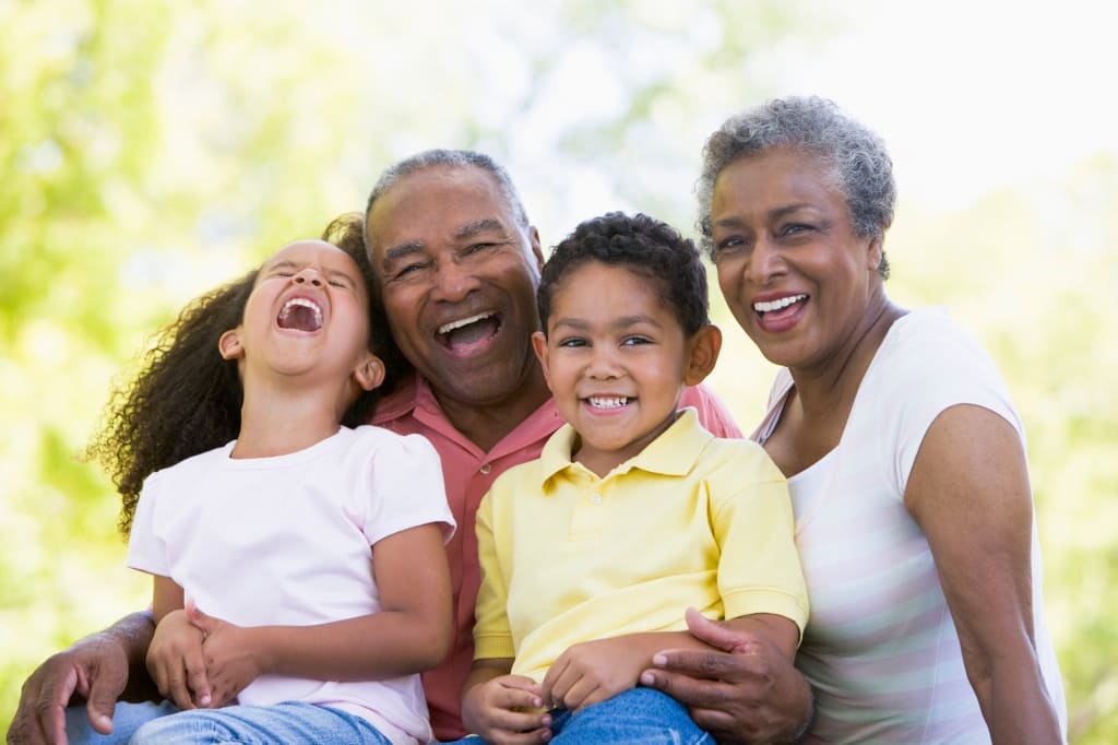 Grandparents Laughing with Their Grandchildren